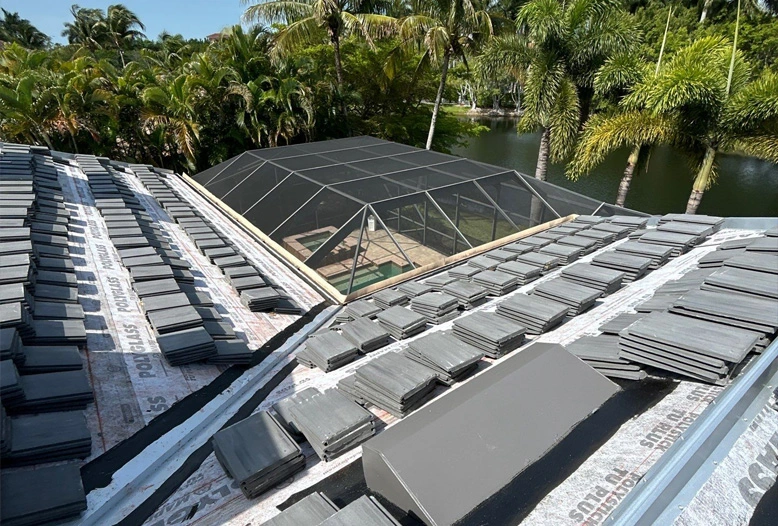 stacks of roof tiles for a new roof installation