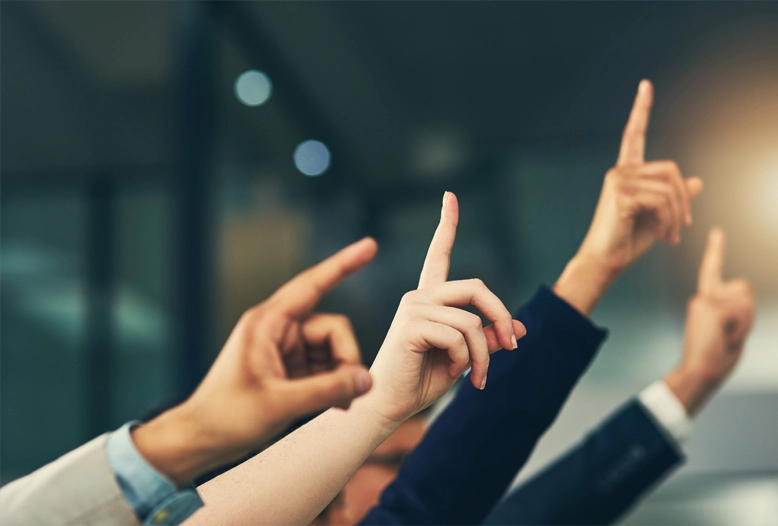hands raising to ask a question